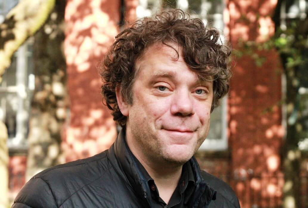 Headshot of Tom Lang